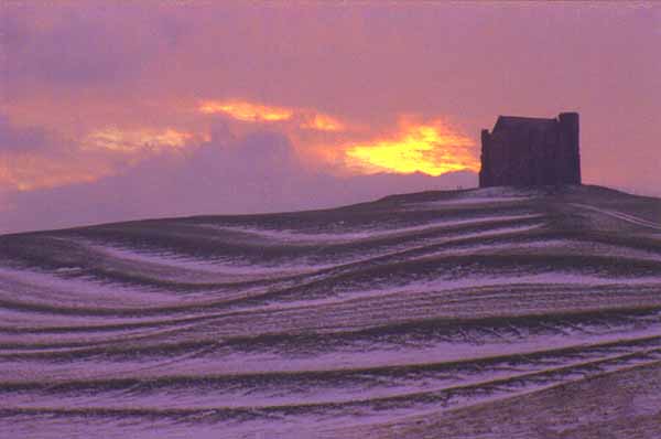 Abbotsbury - St Catherine's Chapel in the snow at Sunset, by Andrew Green