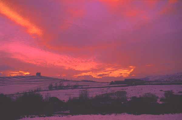 Abbotsbury in the snow at sunset, by Andrew Green